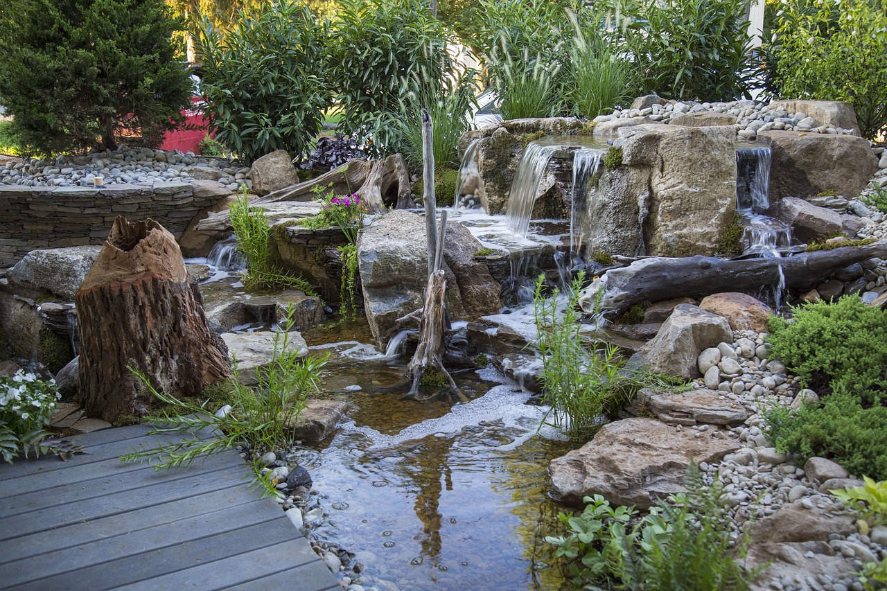 Waterfalls and Swimming Pools – How to Build a Backyard Water Feature ...